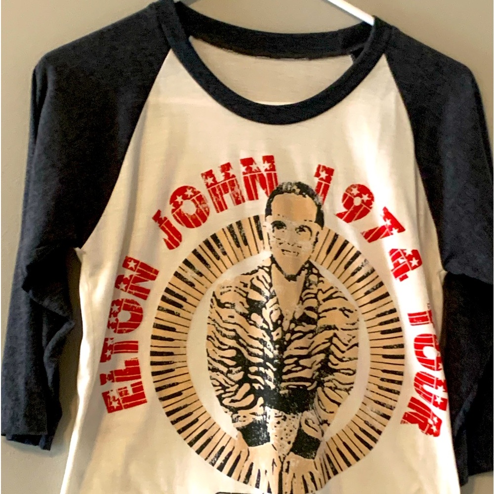 Elton John Goodbye Yellow Brick Road baseball style shirt.